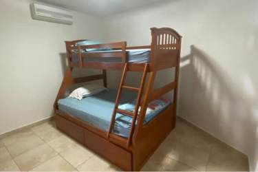 Oceanfront infinity swimming pools with sun loungers at PH Coronado Country Club Panama