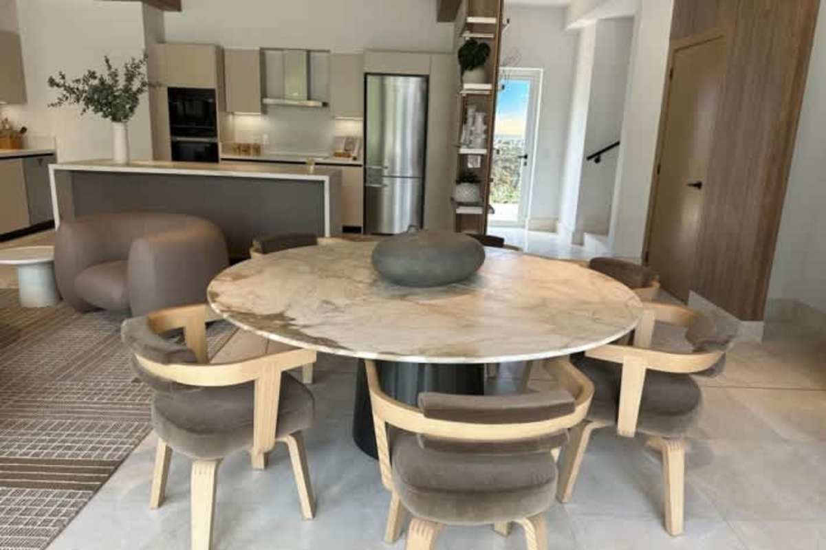 Luxury bedroom with full-height windows and golf views at Oceana Skyhomes Santa Maria Panama