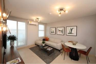 Modern style open kitchen with dining area new apartment in Panama Pacifico