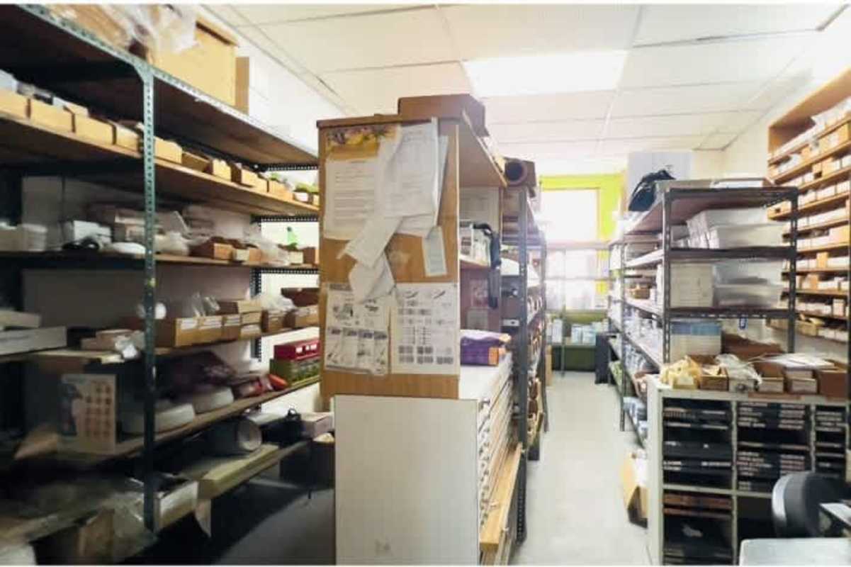 Storage room with metal shelves, boxes and supplies commercial property for sale Panama City