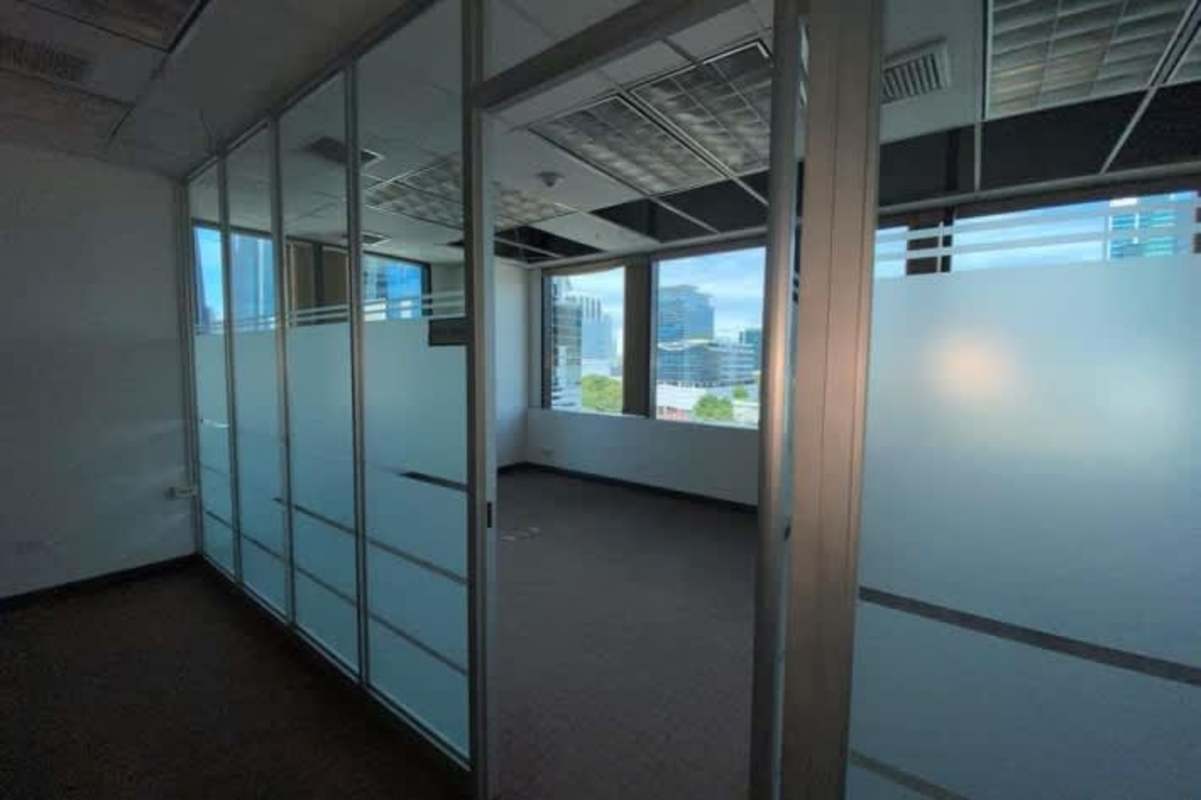 Empty open office space with glass divisions inside PH Plaza Credicorp Bank Obarrio Panama