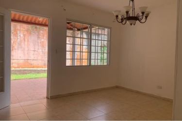 Dining space with large window and glass door to terrace in La Chorrera Panama
