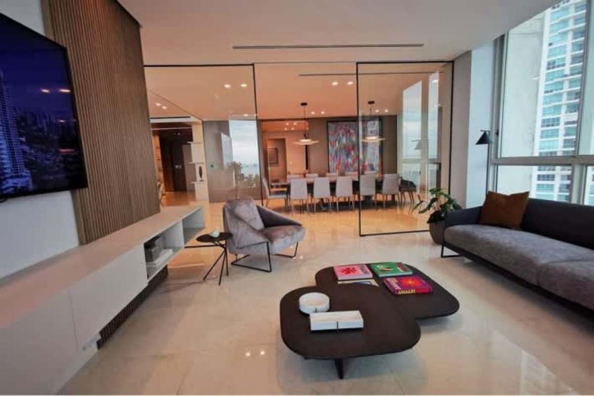 Modern master bedroom with oceanfront views, floor-to-ceiling windows at PH Pacific Point Punta Pacifica Panama City