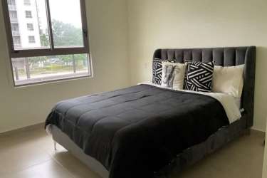 Modern bedroom with gray bed neutral tones PH Woodlands Panama Pacifico