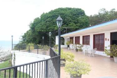 Luxury pool with tropical landscaping and gazebo in beachfront estate Guanico Antón Panama