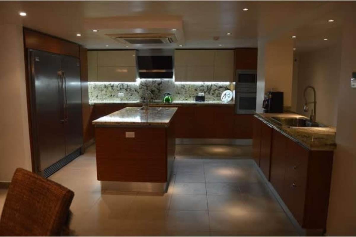 Modern kitchen with granite island and luxury finishes in mansion Panama