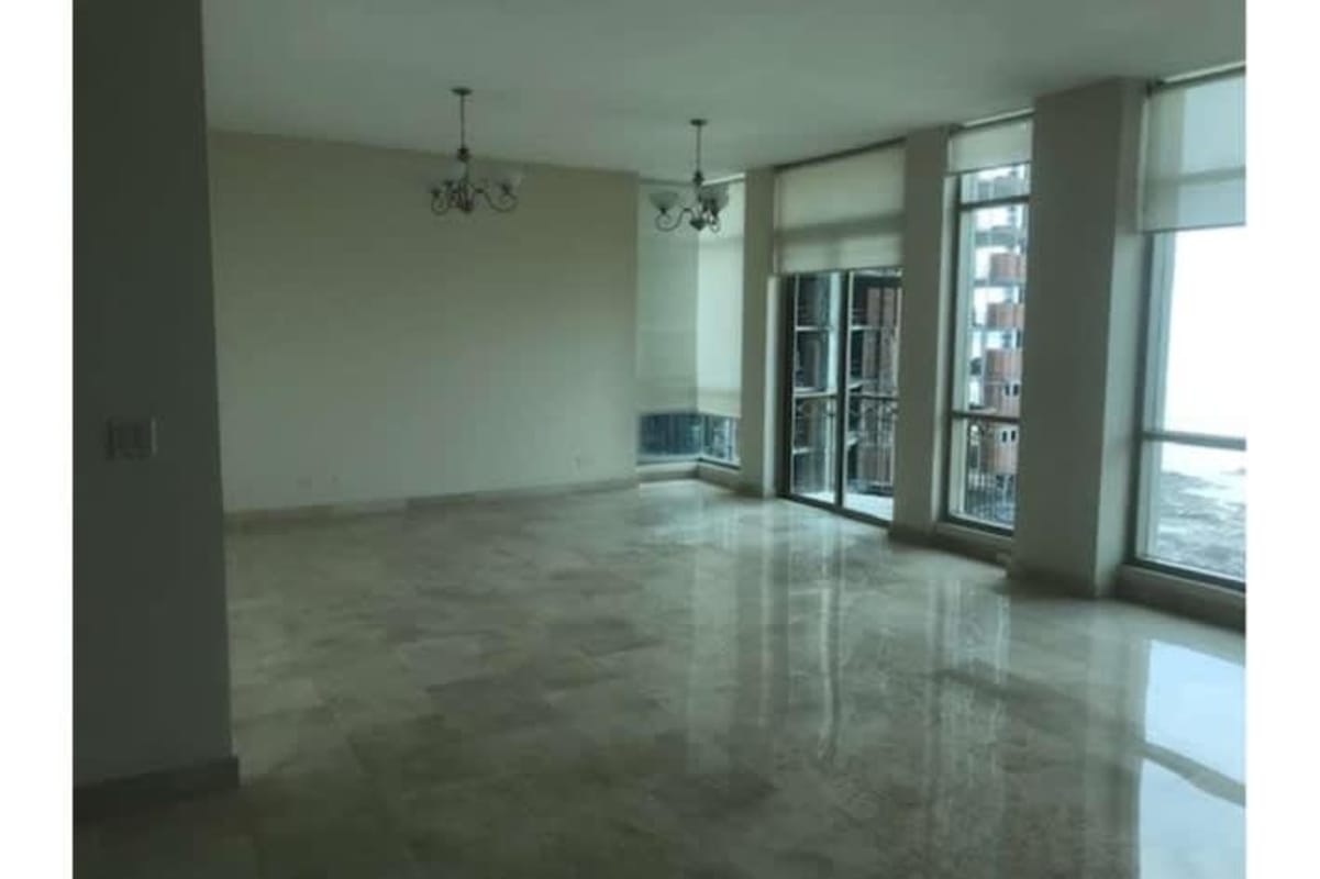 Contemporary kitchen with stainless steel appliances, quartz countertops and ocean view in Pacific Point Tower 300