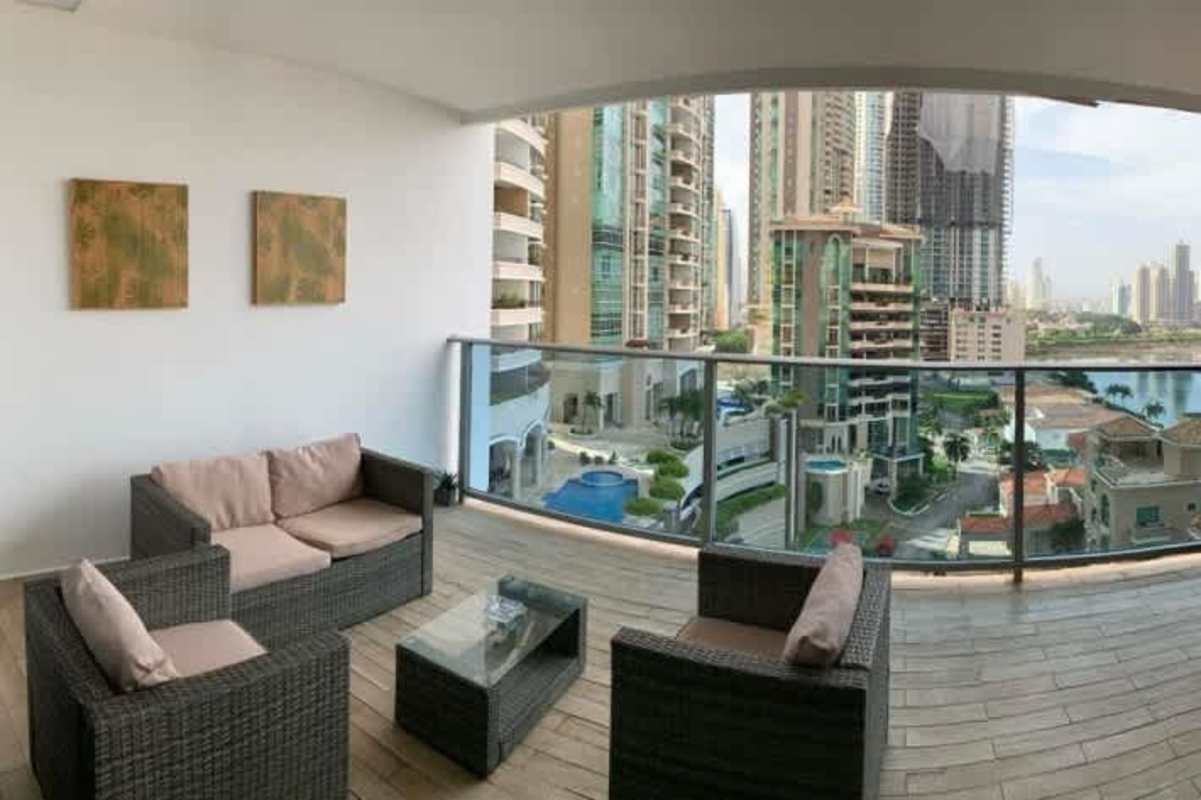 Expansive balcony with outdoor seating, skyline and ocean views Punta Pacifica Panama