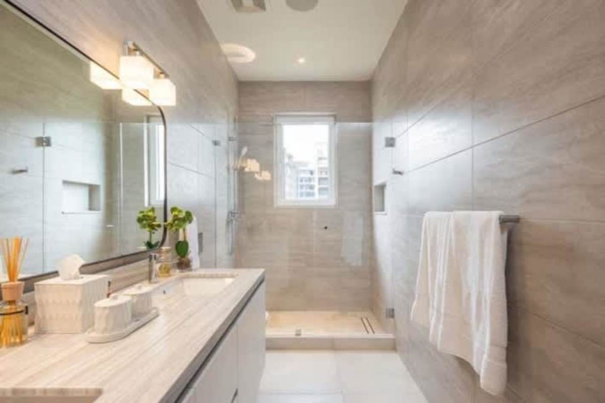 Luxury kitchen with marble countertop and modern appliances in The Woods Santa Maria Golf & Country Club Panama