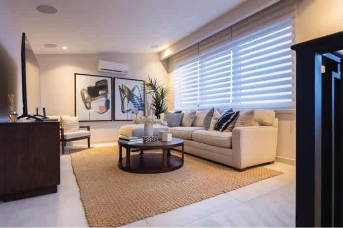 Luxury master bedroom with large windows and golf views in The Woods Santa Maria Panama City