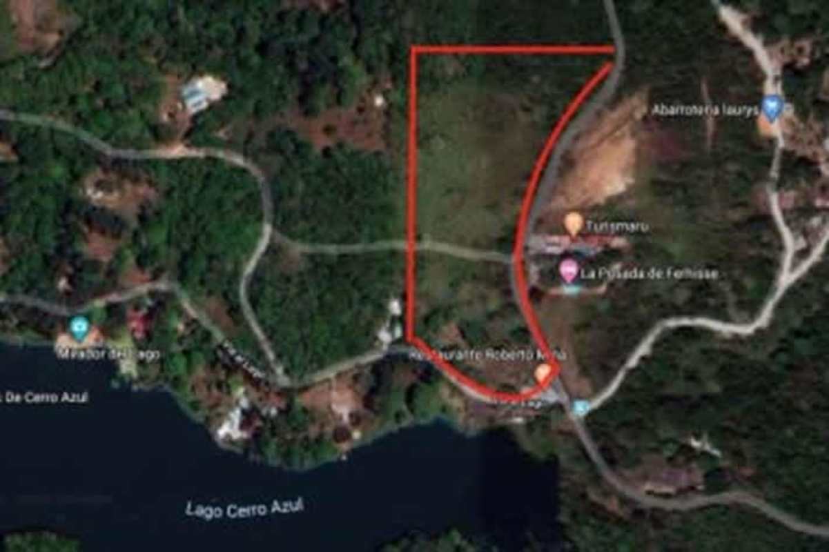 Aerial outlined lakefront mountain property surrounded by forest and lake in Cerro Azul Panama