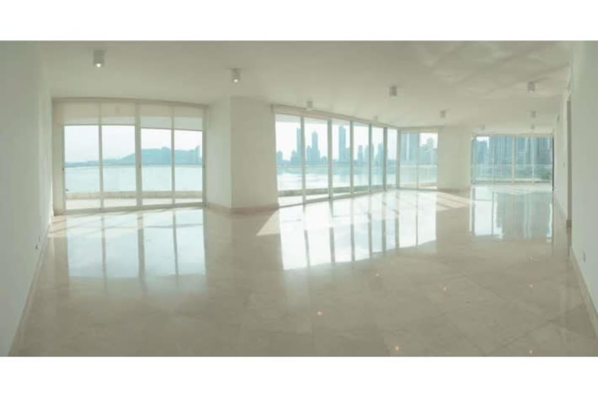 Spacious master bedroom with floor to ceiling windows ocean view Punta Paitilla