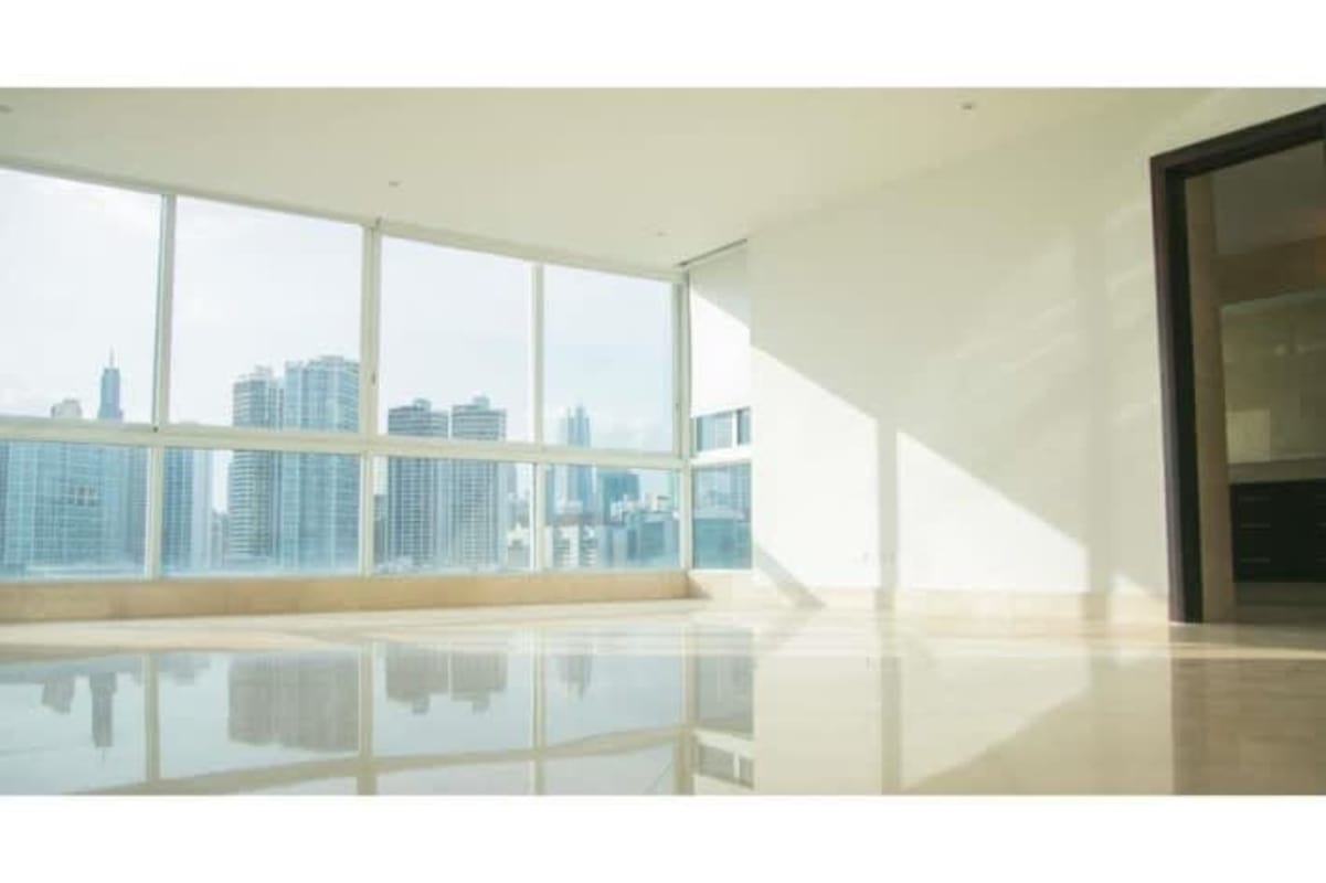 Modern living room with panoramic water views in The Point Punta Paitilla Panama City