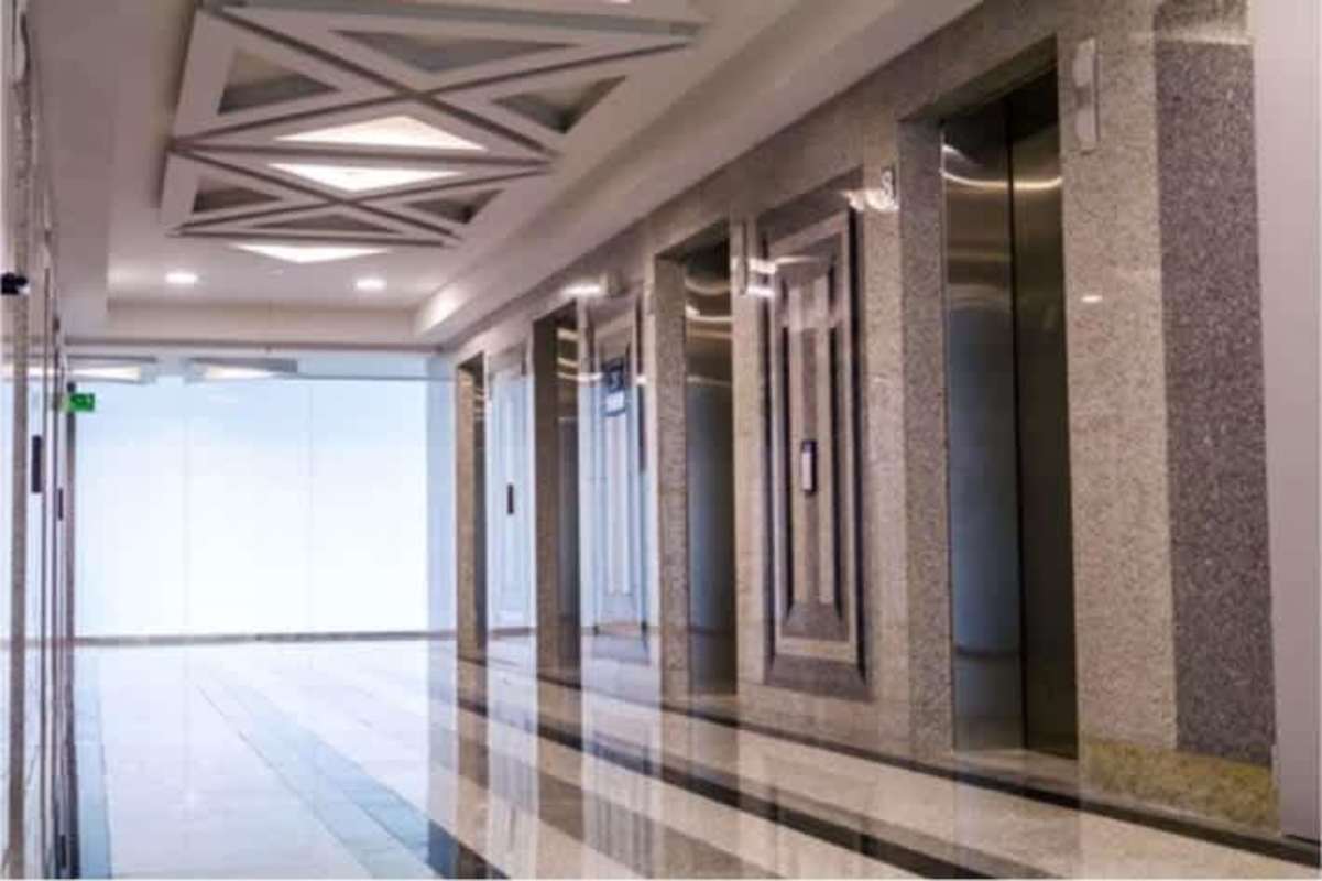 Polished elevator lobby with modern ceiling design at Evolution Tower Panama