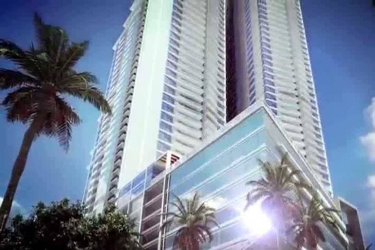 Elegant double height lobby with marble floors at PH Costanera Towers Panama