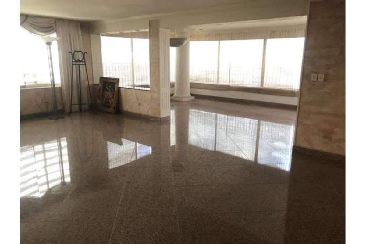 Elevated view of Pacific Ocean, city highway, skyline from penthouse balcony in Panama