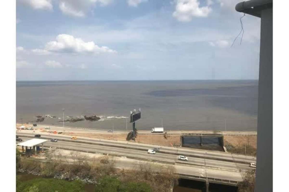 Luxury penthouse panoramic wraparound balcony with ocean and skyline views in Panama City
