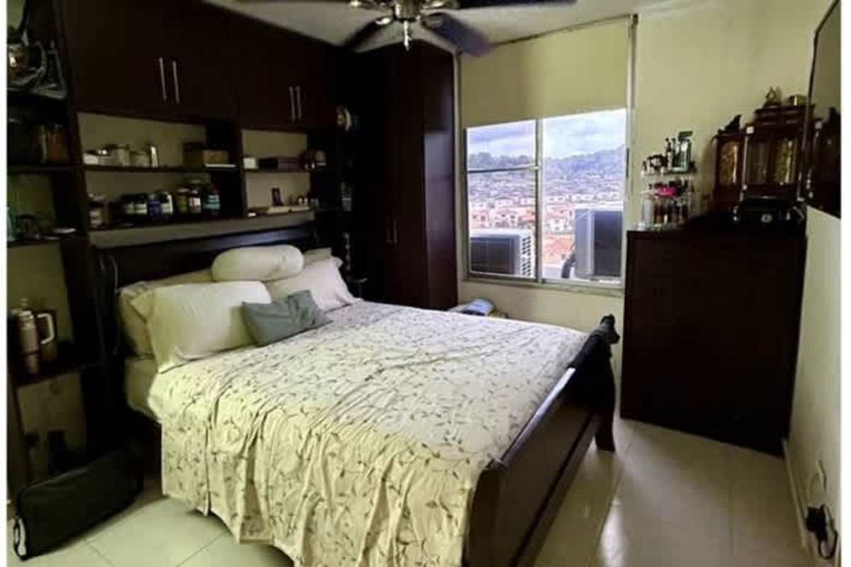 Bedroom with city view, closet and ceiling fan in Altos del Condado Condado del Rey Panama