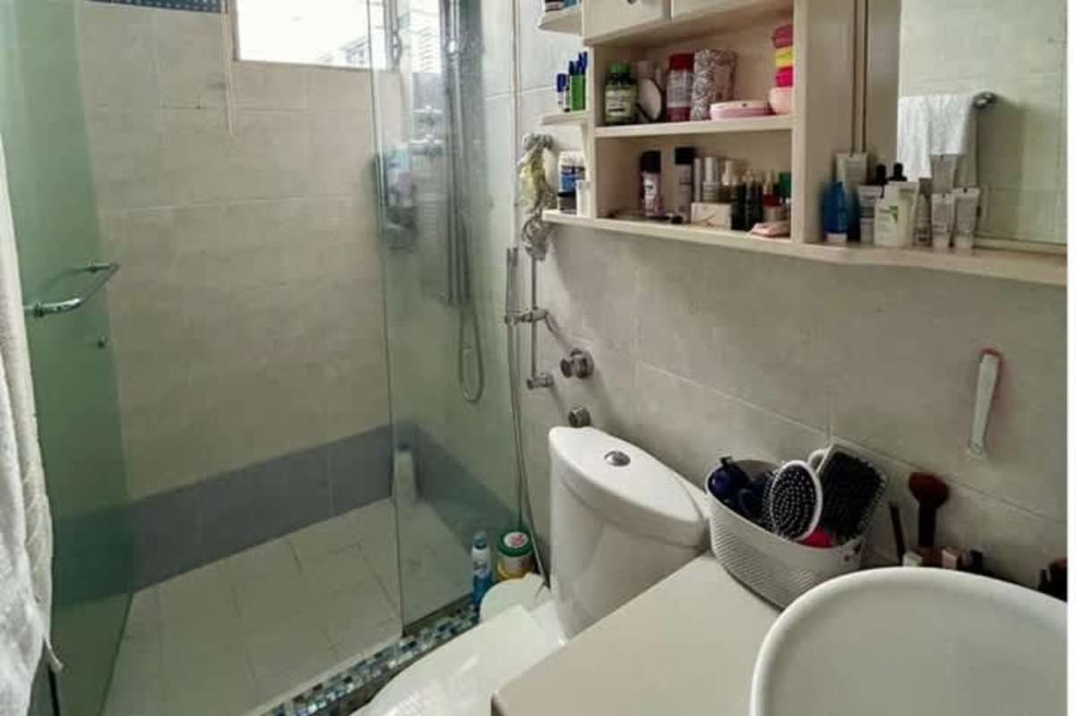 Bathroom with vessel sink, glass shower, shelves and modern finishes in PH Altos del Condado Panama