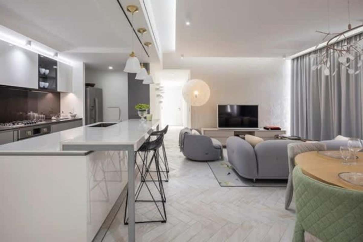 Modern designer kitchen with dining lounge and panoramic windows Empire Residences Obarrio Panama