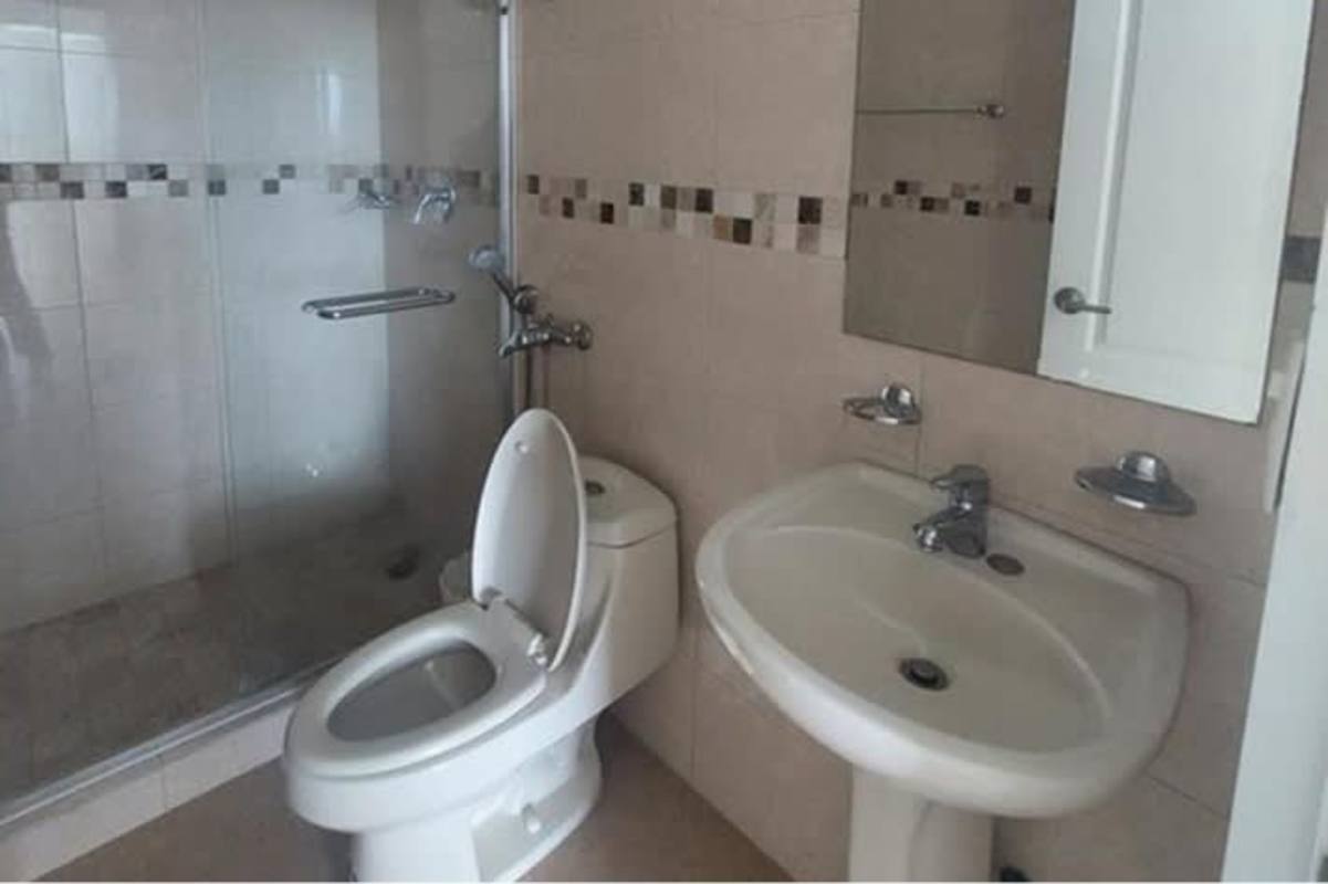 Contemporary bathroom with glass shower, tiled walls, vanity sink in PH San Francisco Tower Panama