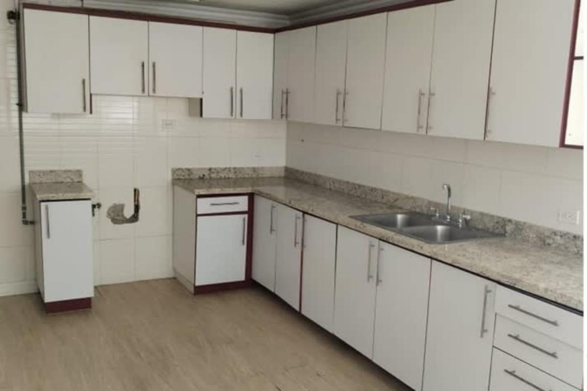 Modern spacious kitchen with granite countertops and ample cabinetry at PH Paitilla Punta Paitilla Panama City