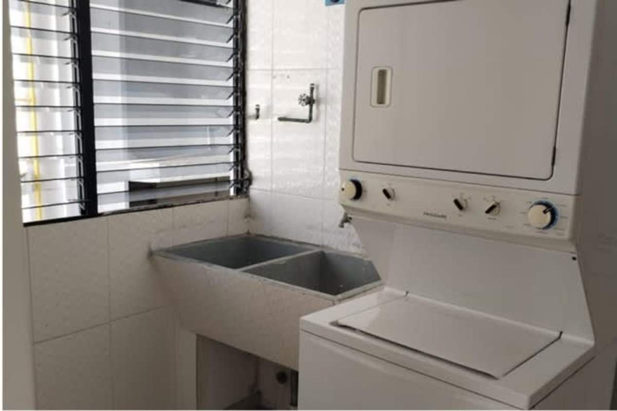 Luxury bathroom with granite countertop and glass shower enclosure at PH Paitilla Punta Paitilla Panama