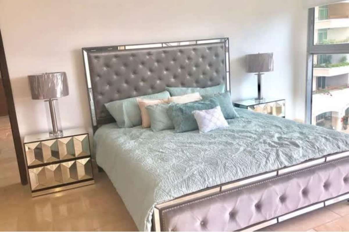 Modern dining area open to living room with ocean views in PH Aqualina Punta Pacifica Panama