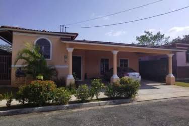 Family home backyard fenced grass area covered terrace Mystic City La Chorrera Panama