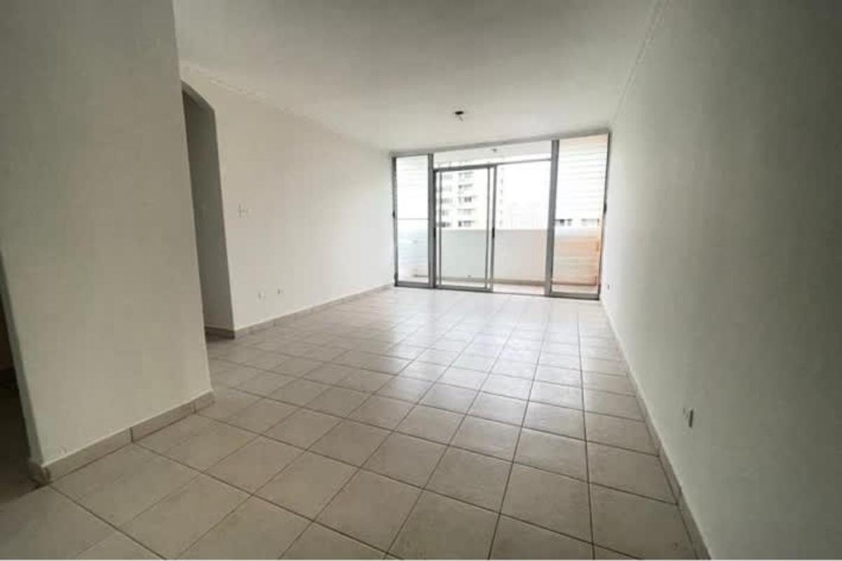 Spacious tiled living room with glass doors to balcony PH Residencial Río Abajo Panama