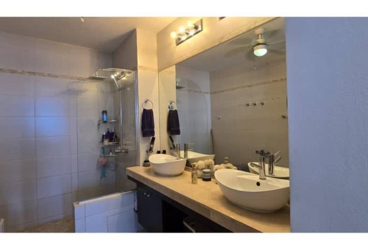 Private oceanfront balcony with glass railing and skyline views at PH Destiny Tower Panama City