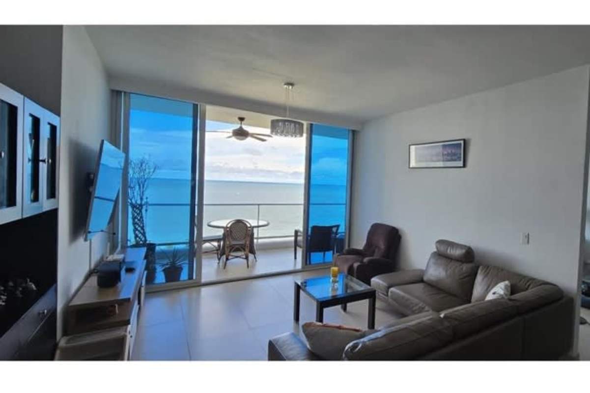 Ocean-view master bedroom with private balcony access at PH Destiny Tower Panama