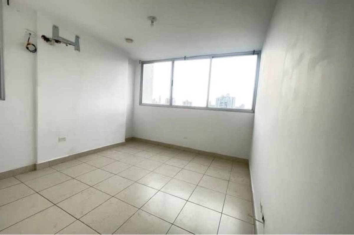 Bedroom featuring built-in wardrobe AC ready and tiled floors in PH Pueblo Nuevo Panama