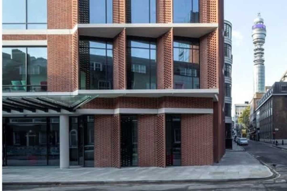 Glass metal front on historic mixed-use property Casco Viejo Panama City