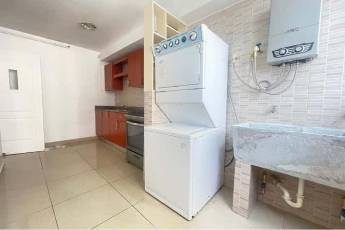 Laundry space with washer dryer hookups and kitchen area PH Vía Romana Panama City