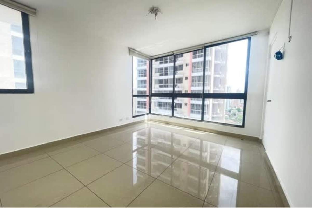 Modern living room with floor-to-ceiling windows, city views, tiled floors in PH Vía Romana Panama City