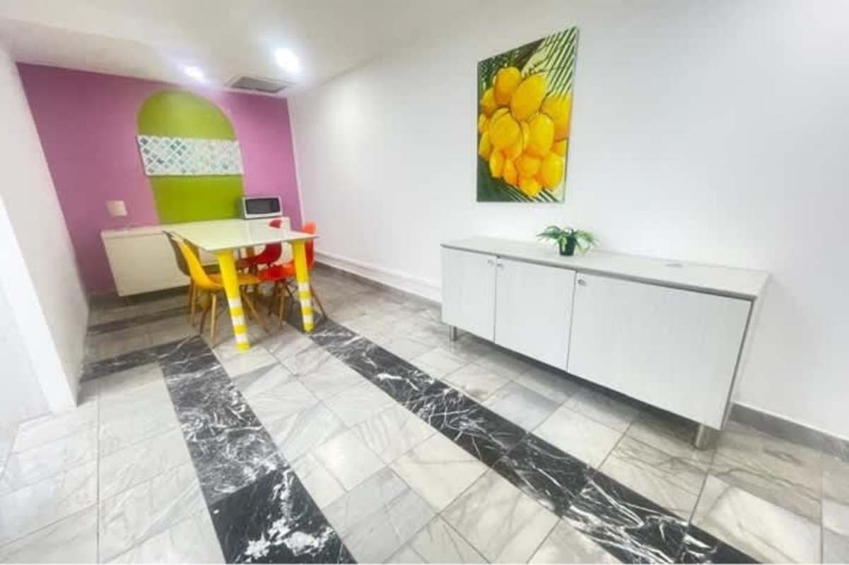 Reception space with marble floors, glass partitions, modern lighting at PH BICSA Tower Avenida Balboa