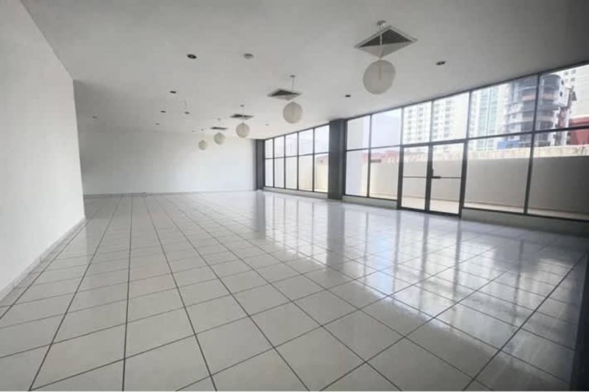 Open lobby or commercial space with large windows in PH San Francisco Tower