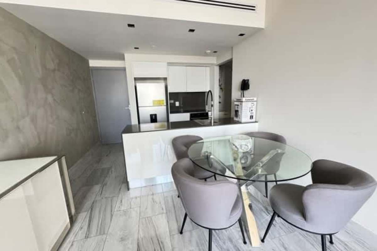 Open plan kitchen with dining area modern furnishings at Yoo Panama Panama City