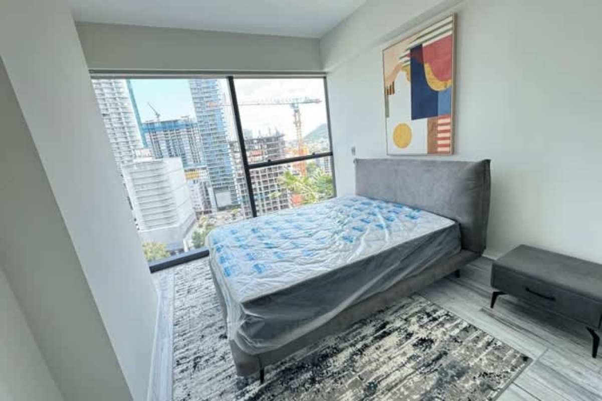 Luxury bedroom with ocean and skyline views fully furnished in Yoo Panama Bella Vista