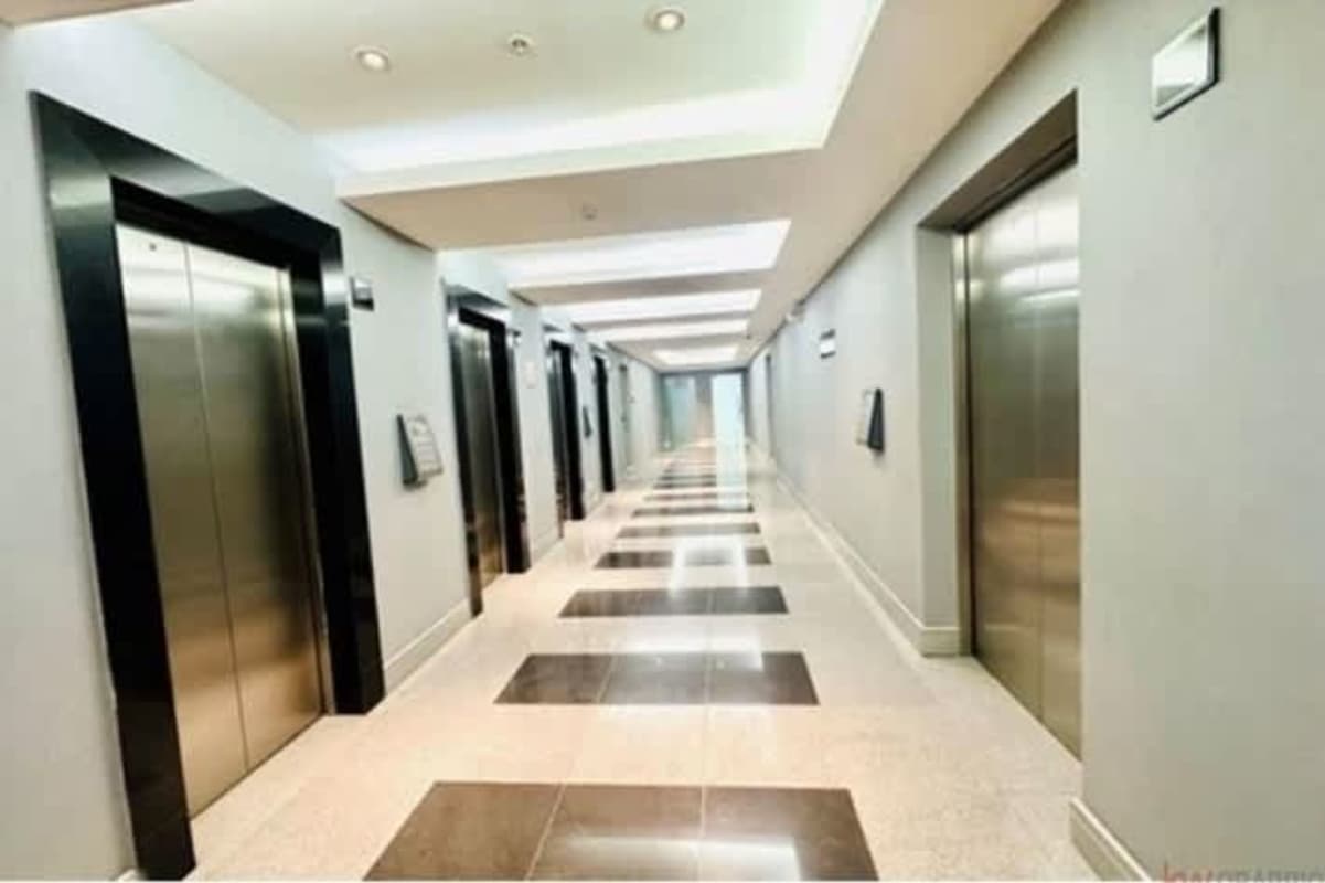 Commercial tower elevator hallway marble flooring Costa del Este Panama