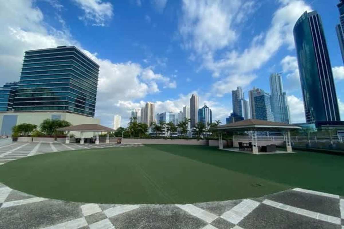 Luxurious bathroom with glass shower and granite vanity in Costa del Este apartment