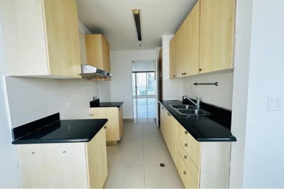 Spacious master suite with ocean view window at PH Murano Tower Costa del Este Panama