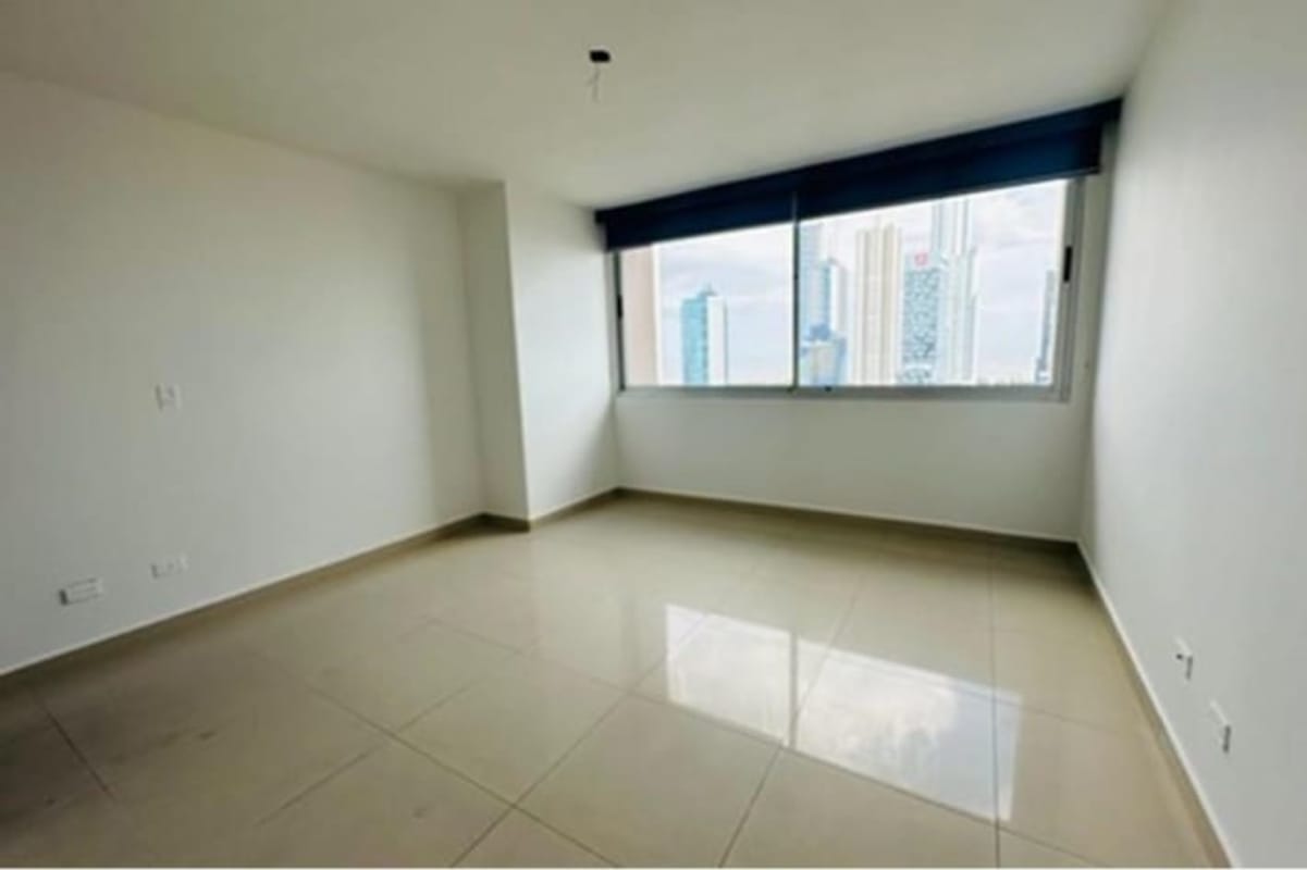 Contemporary kitchen with granite countertops and city view window in PH Murano Costa del Este Panama
