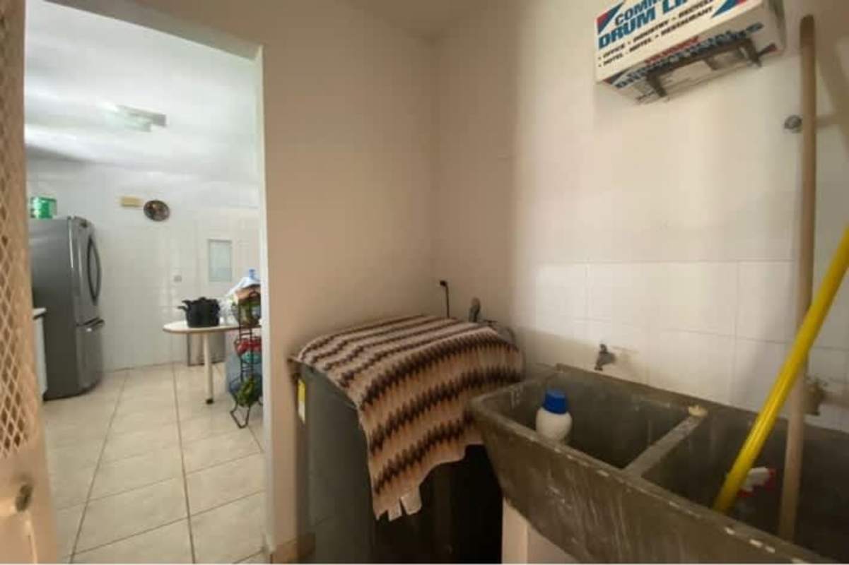 Backyard tropical garden with banana trees and patio in Terrazas de Brisas del Golf Panama