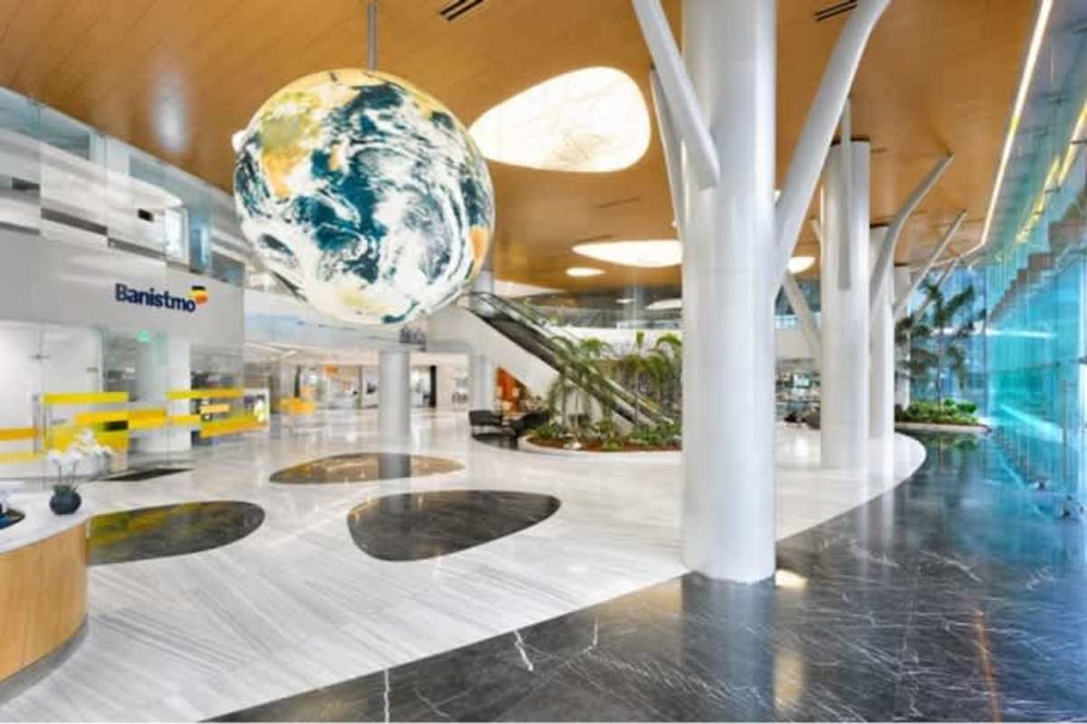 Lobby with globe sculpture escalator marble floor Ocean Business Plaza Costa del Este Panama