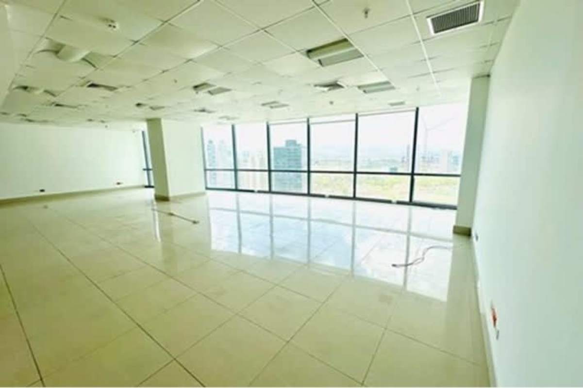 Modern lobby with globe sculpture marble floors and indoor gardens Ocean Business Plaza Costa del Este