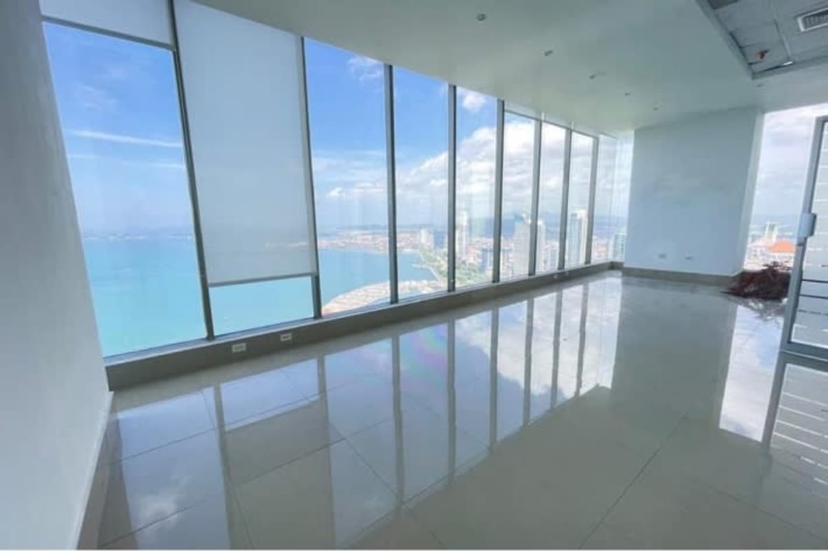 High-rise office room overlooking the Pacific Ocean with large windows at PH BICSA Tower Panama City