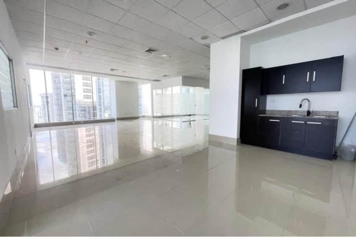 Commercial office space with panoramic windows and city view at PH BICSA Tower