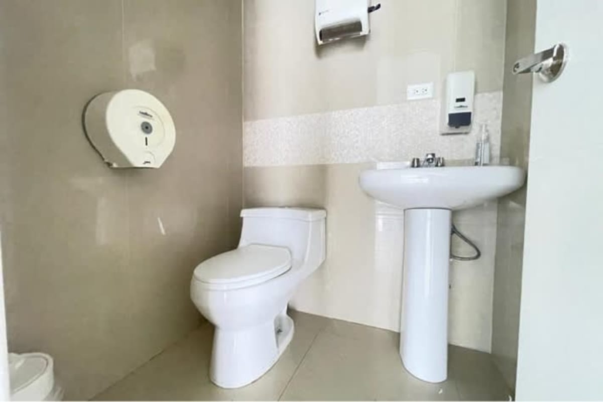 High floor office with glass walls and skyline view from PH BICSA Tower Avenida Balboa